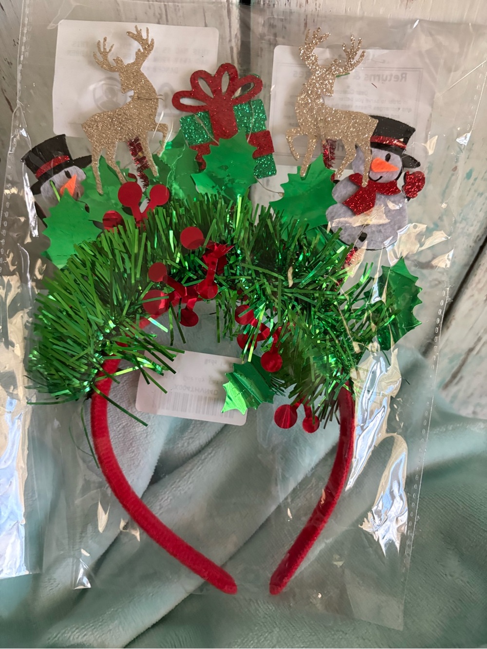 Lot of Christmas items headband lights up, tablecloth, tissue & envelope wraps